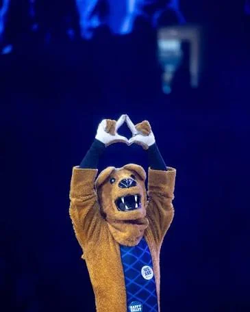 The Nittany Lion making heart hands with a For The Kids scarf at THON
