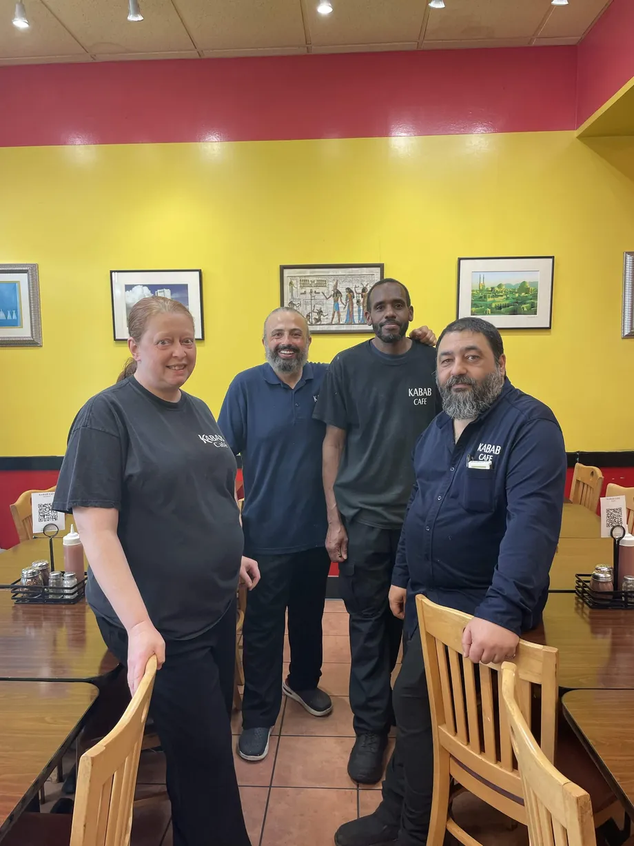 The Kabab Cafe team inside their restaurant in Wayne, PA